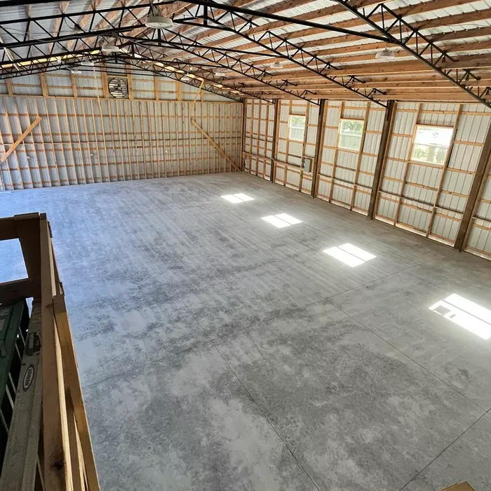 Commercial flake epoxy flooring in a Tampa, FL warehouse bay