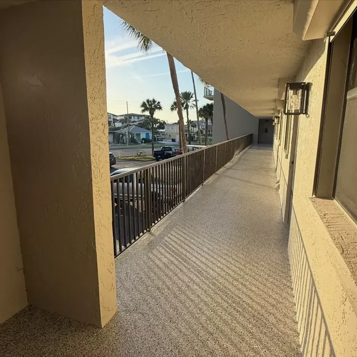 Exterior walkway coating at a Tampa, FL apartment property