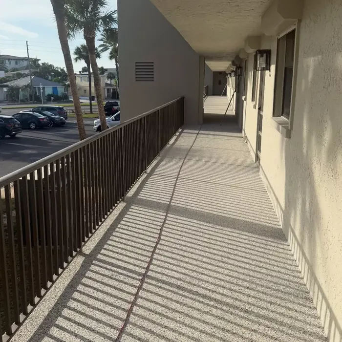Full-flake coating in an exterior breezeway in Tampa, FL