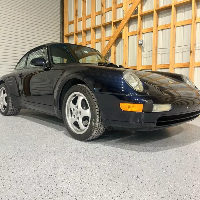 Sports car parked on a finished garage floor coating in Beacon Square, FL