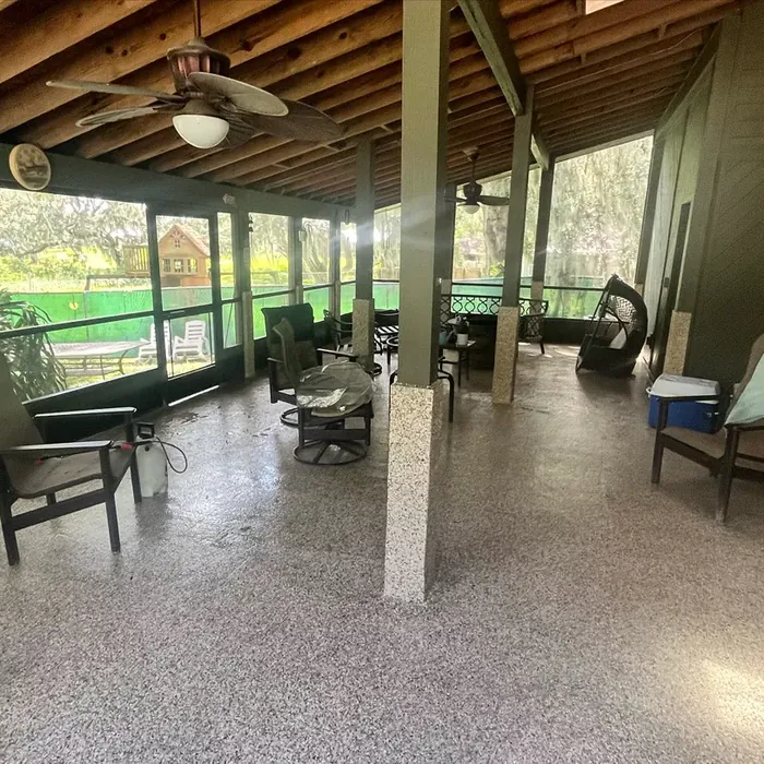 Full-flake floor coating on a screened lanai in Tampa, FL