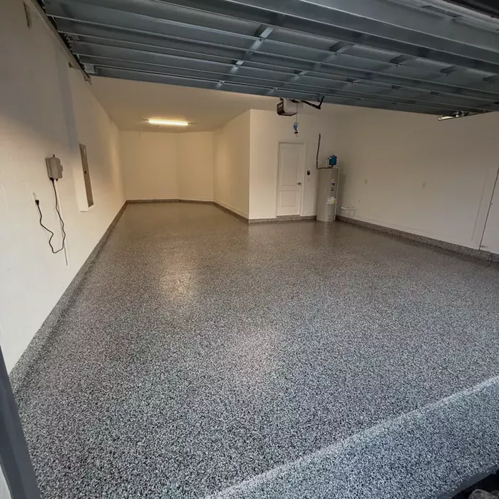 Garage floor coating with gray flake in a garage