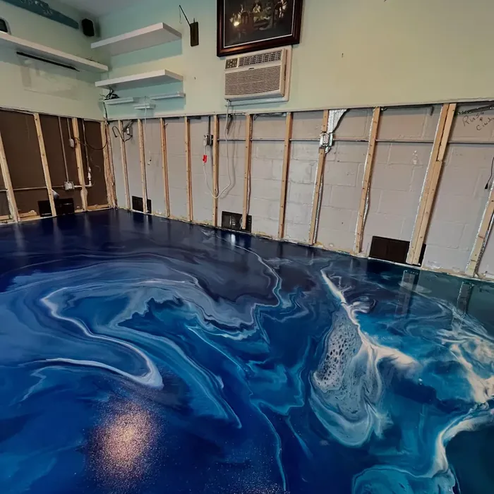 Blue metallic epoxy flooring in a Tampa, FL garage