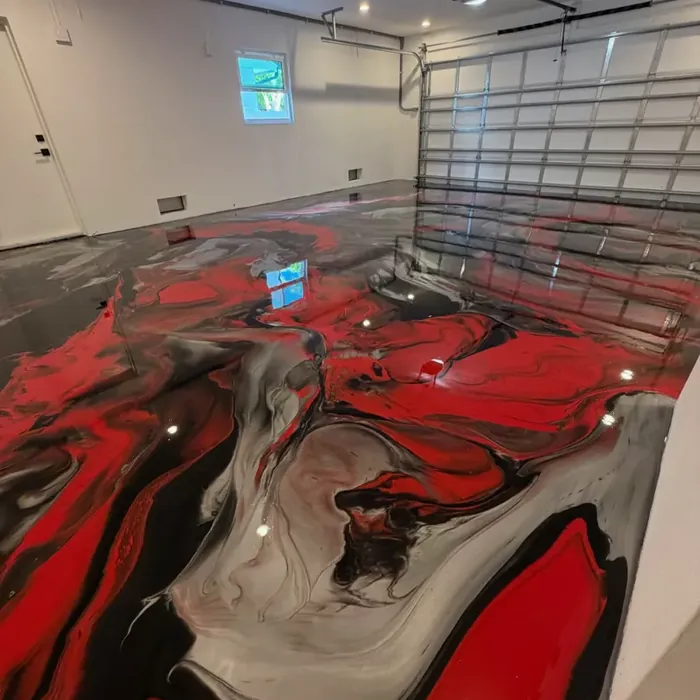 Red and black metallic epoxy flooring in a Tampa, FL garage