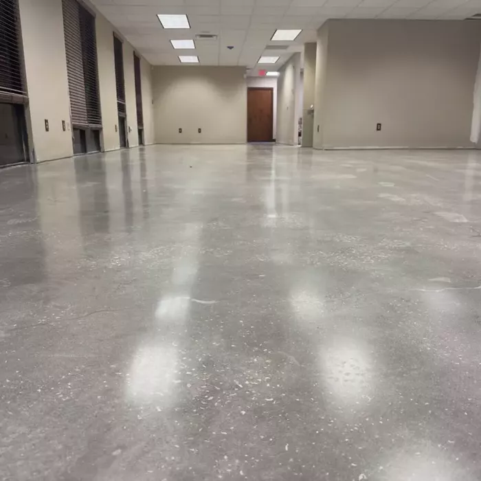 Polished concrete floors in a commercial hallway