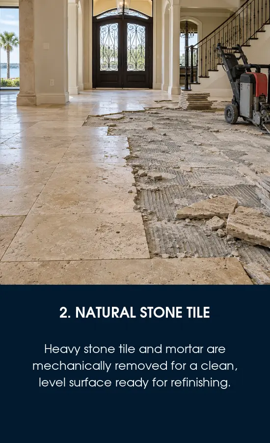 Tile removal of natural stone in a Tampa, FL foyer